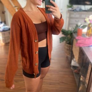 Orange Melloday knit cardigan, like new. Size medium